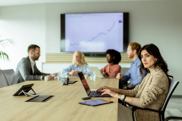 istock Strategic team meeting at a bright office space discussing growth metrics 2153981496