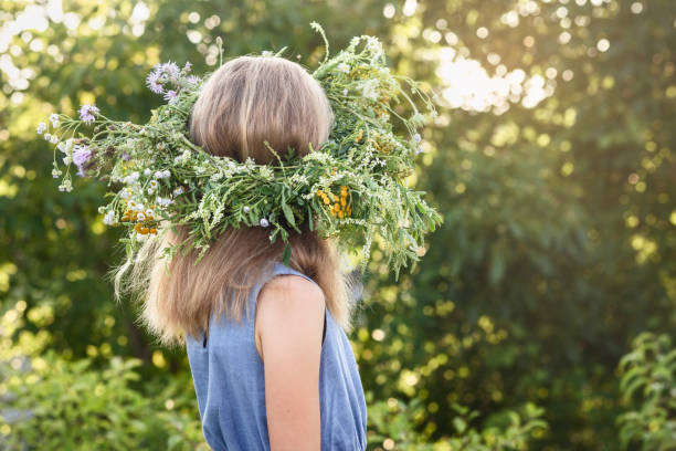istock Girl in Wreath Flowers on Head 2153983810