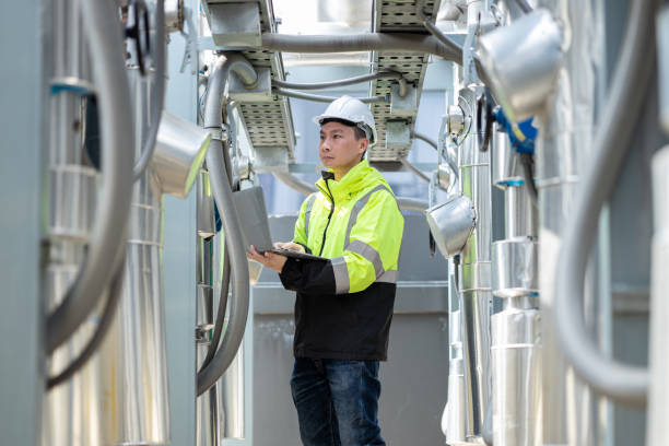 istock Engineer Inspecting Chilled Water Fan Coil Unit 2153985267