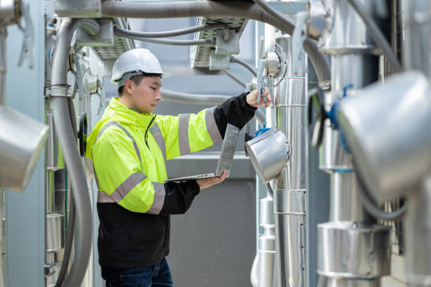 istock Engineer checking the industry chilled water fan coil unit air conditioner 2153985415