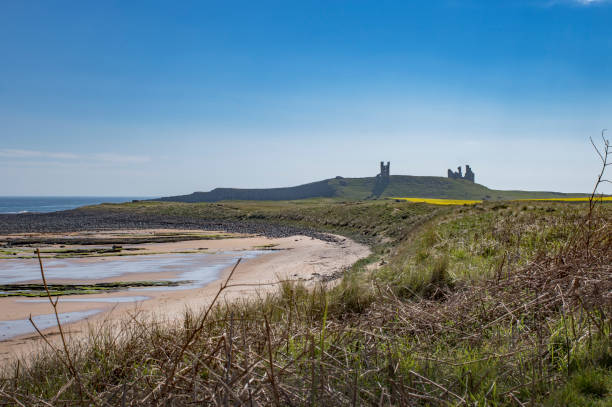 istock Northumberland beach near ruined castle 2153986191