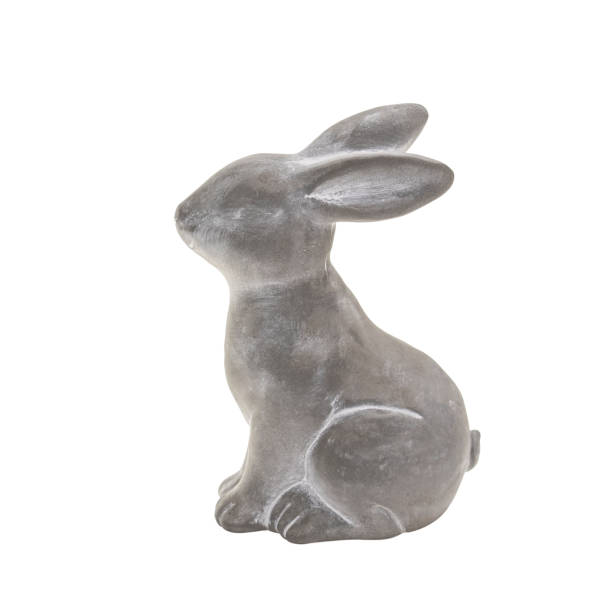 istock cute cement rabbit statue for decorate isolated on white background 2153989441