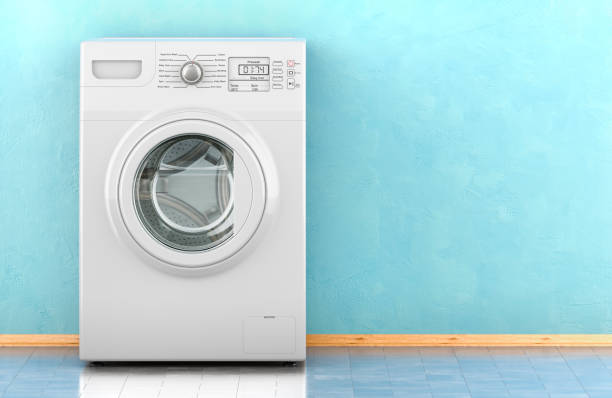 istock Washing machine in room near the wall, front view. 3D rendering 2153989984