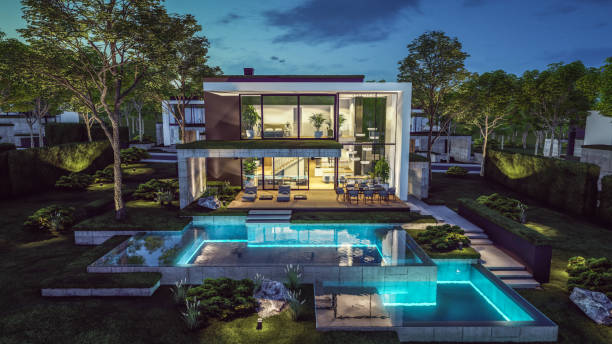 istock 3d rendering of modern house in luxurious style in night 2153990256