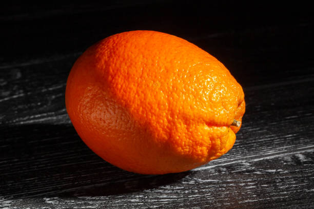 istock calabrian oval blond oranges on black wood 2153993169
