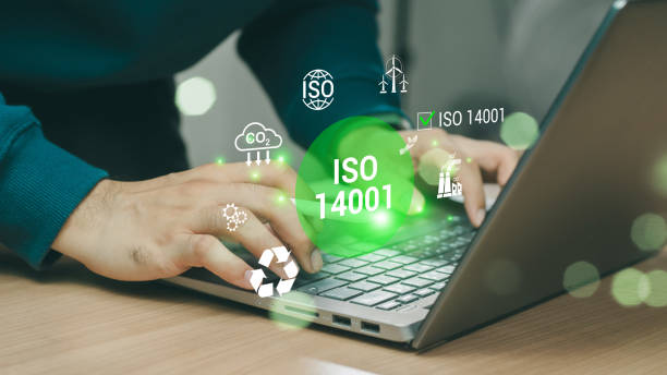 istock ISO 14001 concept. ISO standards quality control 14001 certified for environmental management systems (EMS). Identify, control and reduce the environmental impact of activities. Modern ISO banner. 2153993669