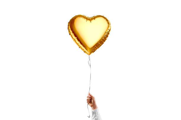 istock Hand holding blank gold heart balloon mockup, isolated 2153993686