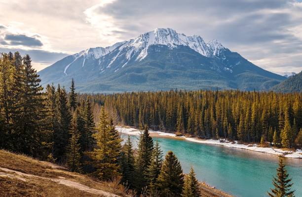 istock Sun Glowing Over A Banff Mountain Valley 2153996907