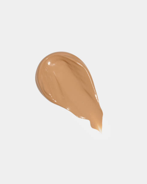 istock Makeup foundation, beige concealer swatch smudge smear on white background. BB CC cream texture 2153997335