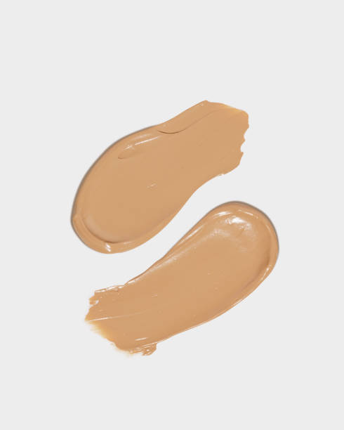 istock Makeup foundation, beige concealer swatch smudge smear on white background. BB CC cream texture 2153997338