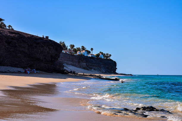 istock A beach with a cliff in the background 2154001366