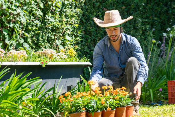 Gardener admiring the flowers