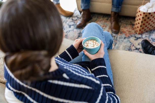 istock High angle view hot chocolate in unrecognizable young woman's mug 2154011445