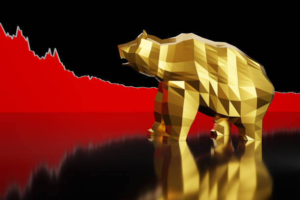 istock Golden bear in front of a red declining line graph on reflective black background. Illustration of the falling stock prices, recession and bearish market 2154011910