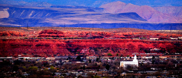 istock St. George Utah Valley with Mormon LDS Temple Red Cliffs and Snow Covered Mountains 2154016671