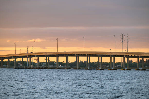 istock Barron Collier Bridge and Gilchrist Bridge in Florida with moving traffic. Transportation infrastructure in Charlotte County connecting Punta Gorda and Port Charlotte over Peace River 2154022079