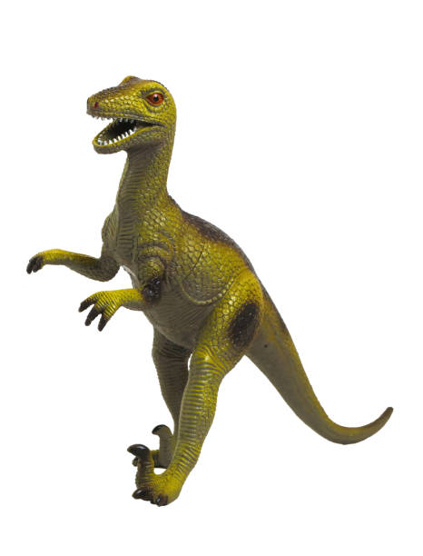 istock Green dinosaur plastic toy i 2154024926