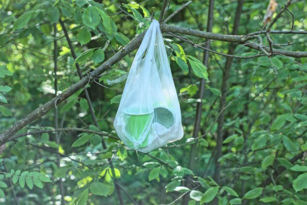istock one white plastic cellophane bag full of garbage 2154025889