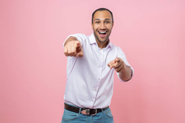 istock Amazed man in white shirt choosing you 2154029020