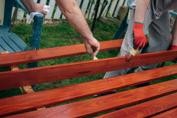 istock painting the fence board 2154030594