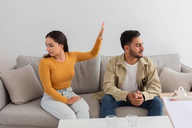 istock Couple having a disagreement during therapy, crisis in relationships 2154036208