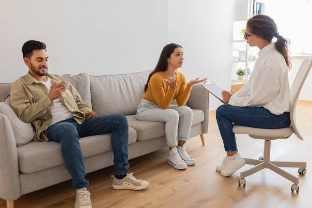 istock Therapist and couple in heated discussion, crisis in relationships 2154036224