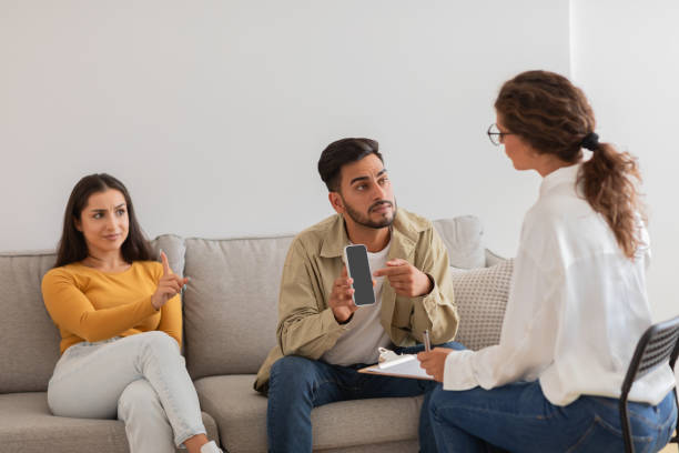 istock Man arguing in a family therapy session 2154036242