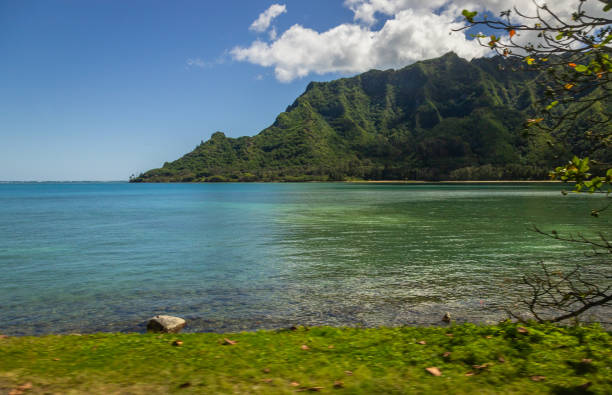 Exposure of pretty Hawaiian sea, shore and mountains along the East coast of Oahu island