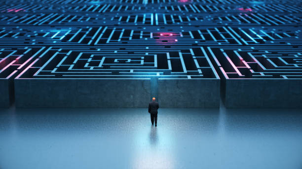 istock Businessman walking into Rectangular maze surrounded by Blue and Red Neon Lights Stock Photo 2154040706
