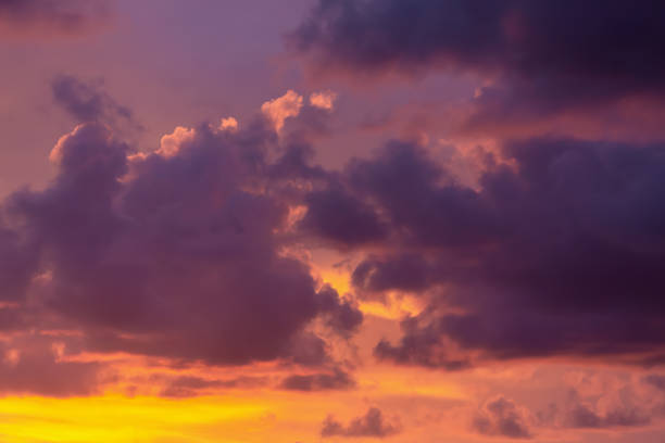 istock Vibrant sunset sky with dramatic clouds, backgrounds and nature themes. 2154044450