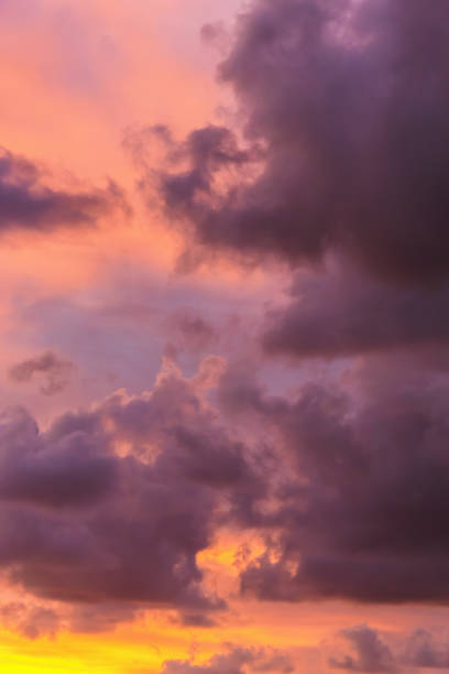 istock Stunning sunset with vivid pink and orange hues illuminating dramatic cloud formations. 2154044451