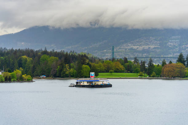 Vancouver city skyline view from Stanley Park, BC British Columbia, Canada on rainy day. Autumn travel destination.