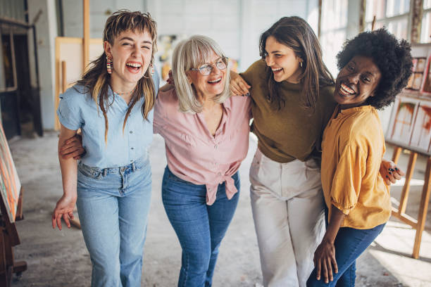 istock Joyful art class - teacher and students embracing creativity 2154056138