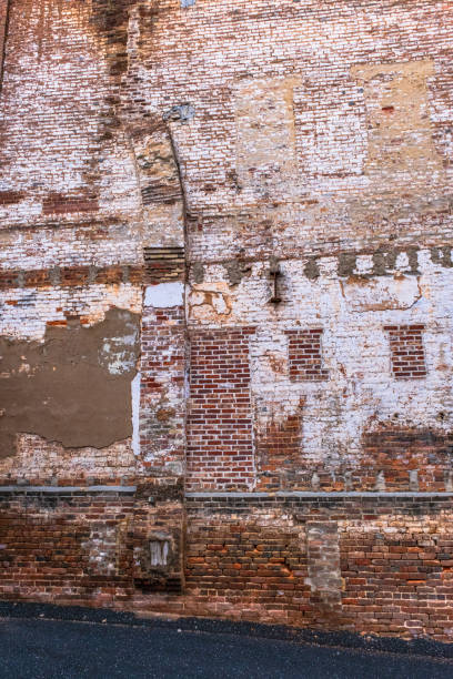 istock Old chimney-like renovations can be seen in this abandoned brick building in downtown Staunton Virginia 2154056837