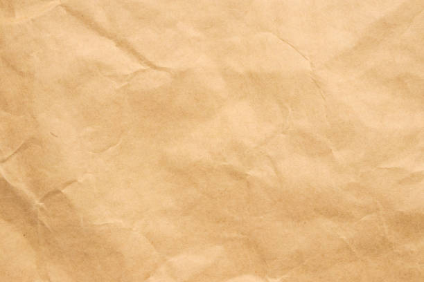 istock Abstract crumpled and creased recycle brown paper texture background 2154057397