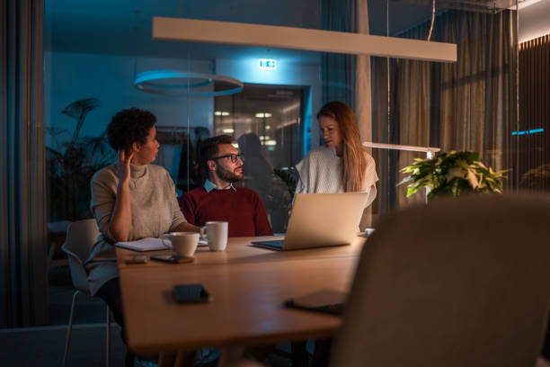 istock Diverse Business Team Working Late in Office 2154057499