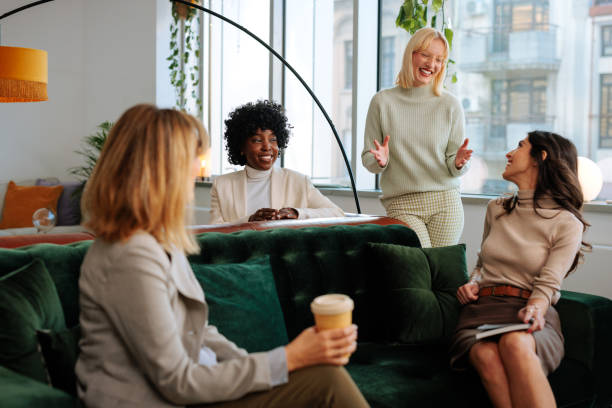 istock Businesswomen relaxing in an office lounge. 2154058655