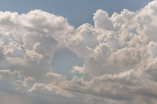 istock The sky is being covered with fluffy white clouds. 2154058672