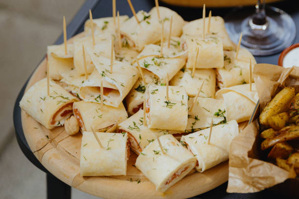 istock Aperitif of flatbread with fish on the table. 2154059737