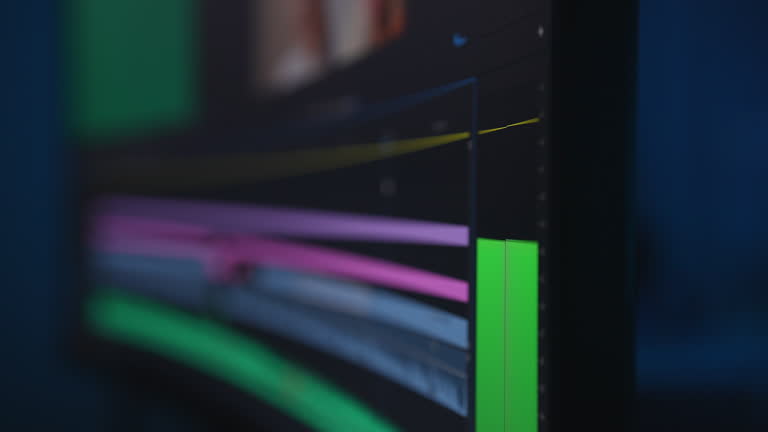 Green digital indicator audio control panels showing sound level of left and right channels in normal limits in computer program on on ultrawide monitor.