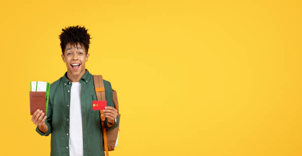 istock Happy young traveler with passport and ticket 2154063057