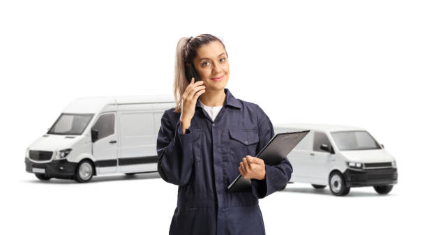 istock Female worker with vans using a mobile phone 2154066589