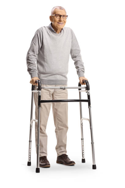 istock Elderly man with a walker isolated on white background 2154066624