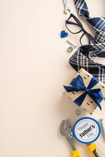 istock Show Dad some love this Father's Day with our curated gift set. Featuring vertical top view of practical tools and sophisticated extras, it's a heartfelt thank-you for all he does 2154067599