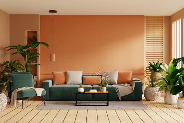 istock Home interior with green armchair and sofa on empty orange wall background,Minimal room- 3D rendering 2154070285