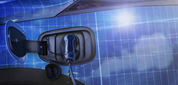 istock EV charging charges an electric car reflection of a solar panel 2154070322