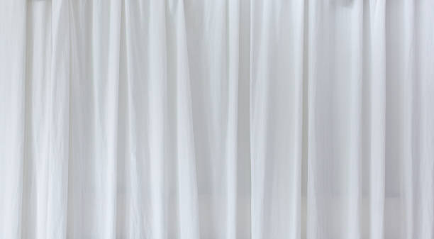 istock The surface of the white curtain is wavy and soft. 2154071281