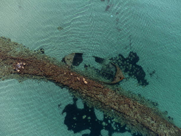 istock World War I Boat Wrecks on Beach 2154074020