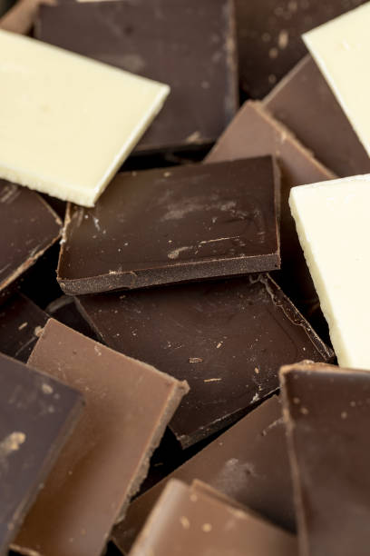 istock dark, milk and white chocolate pieces 2154083130