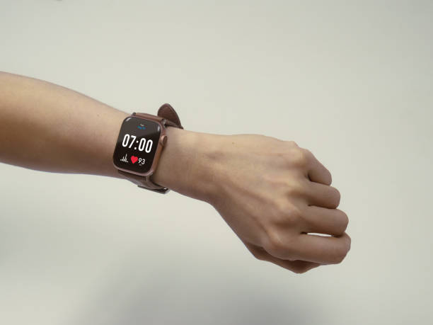 istock Close up man watching smart watch application. Wearable technology concept 2154084073